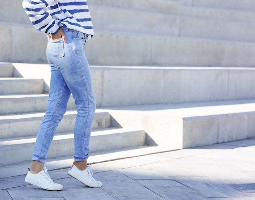 Casual jeans and sneakers outfit in Paris.
