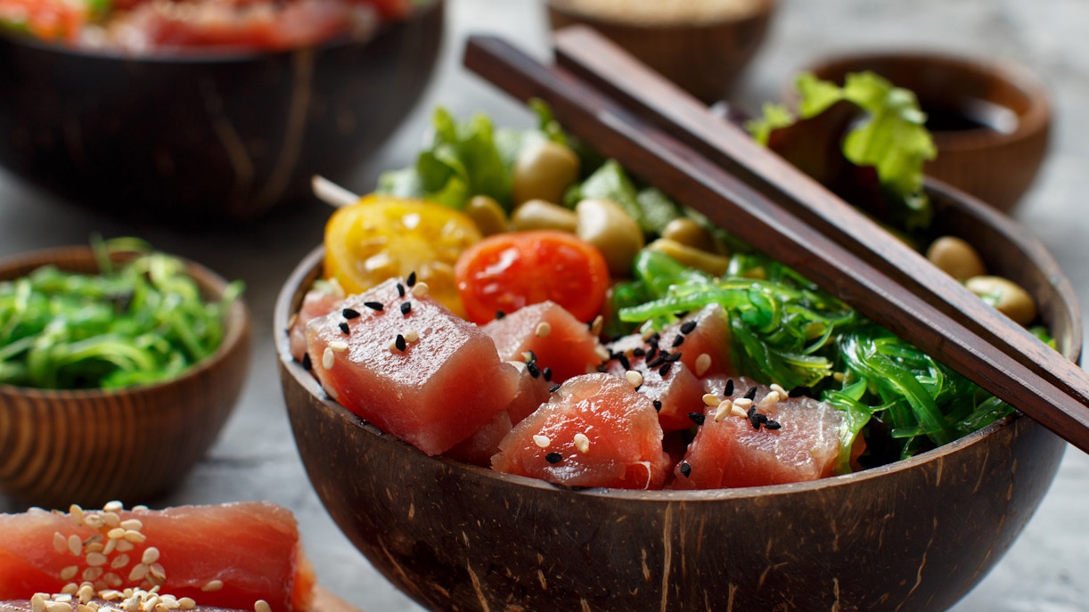Poke bowls with fresh ingredients at a London street food market.
