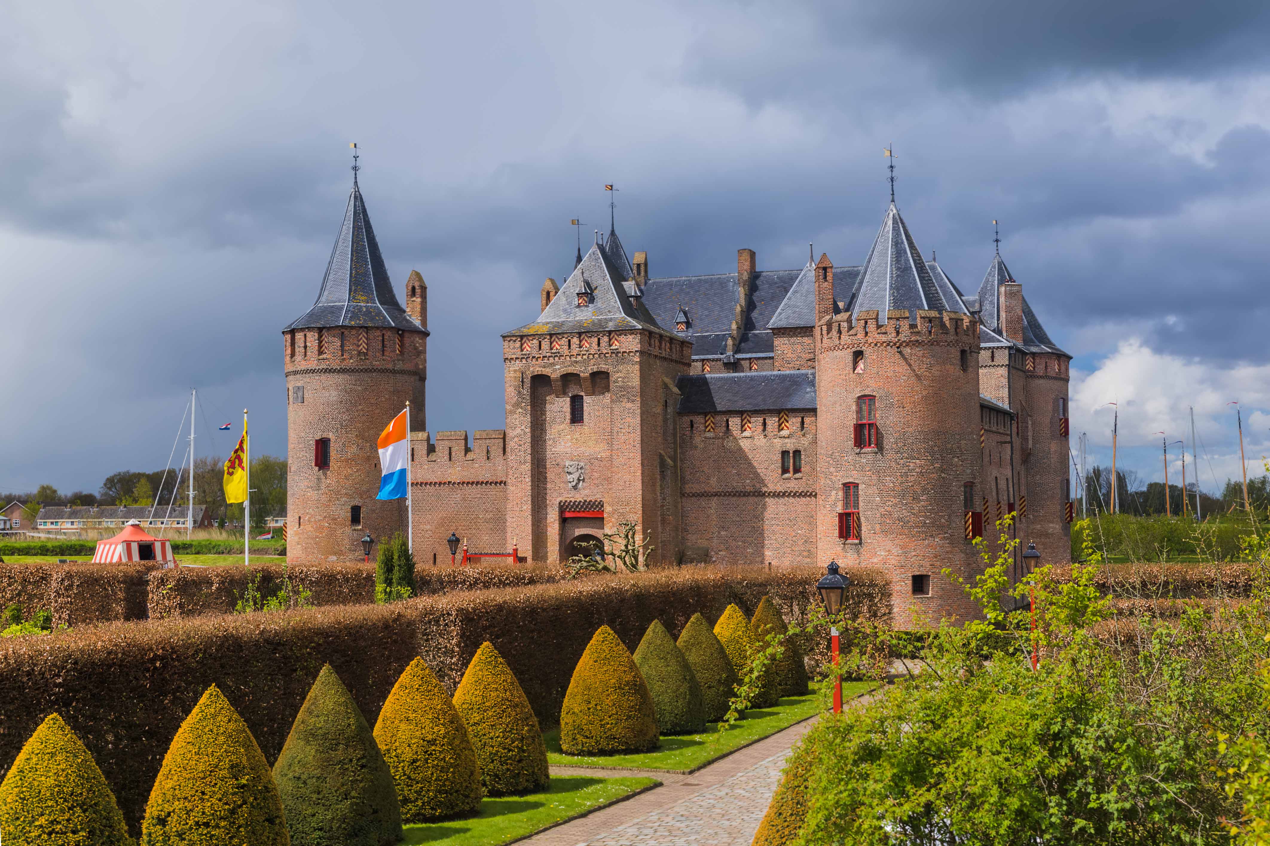 Amsterdam Castle Muiderslot with moat and gardens, accessible with Amsterdam City Card.