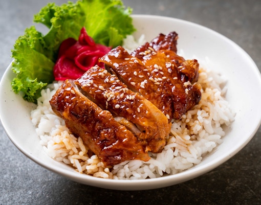 Liao Fan Hawker Chan stall serving Singapore street food with customers in line.