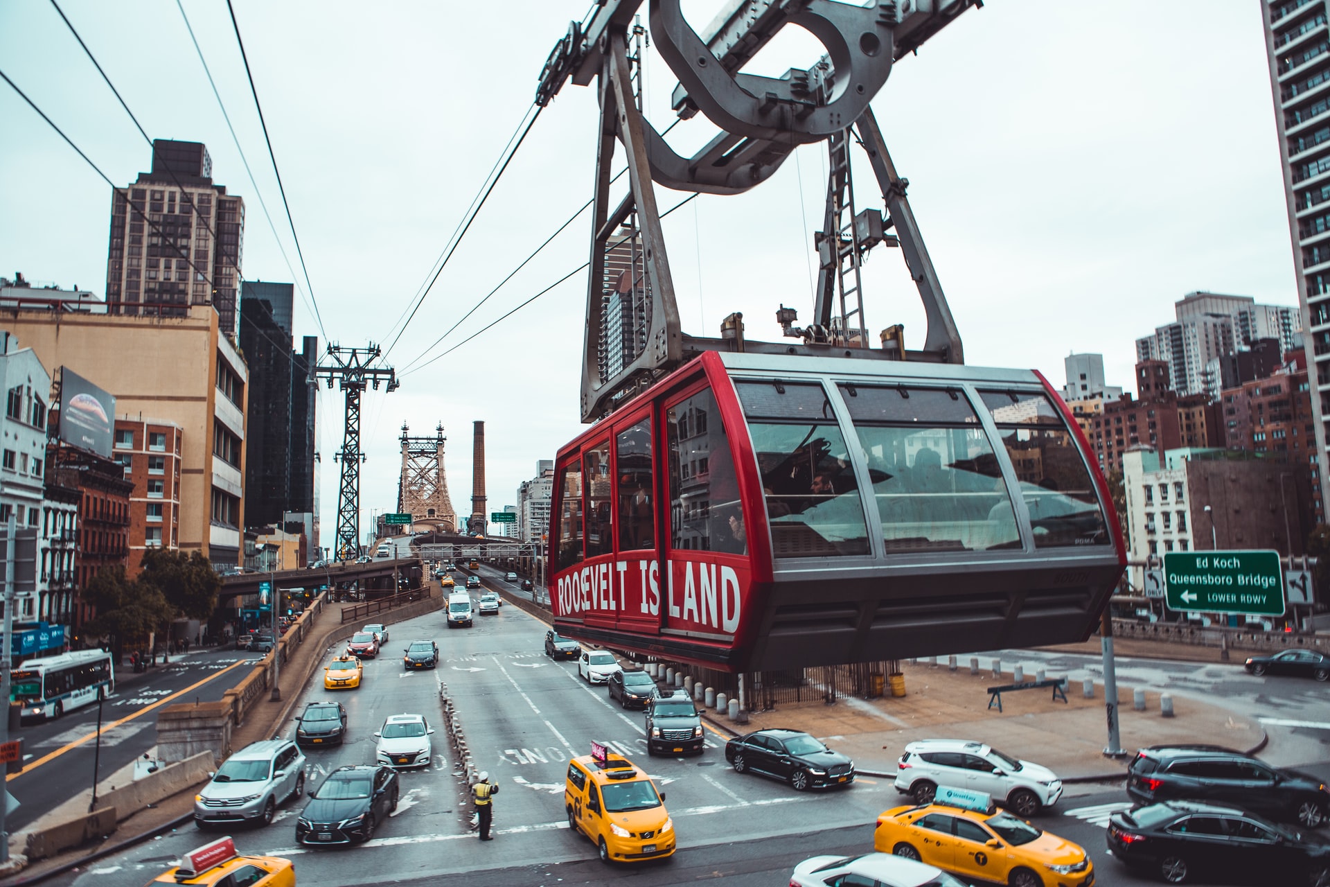 Roosevelt Island Tram over East River with NYC skyline, Valentine's Day experience.