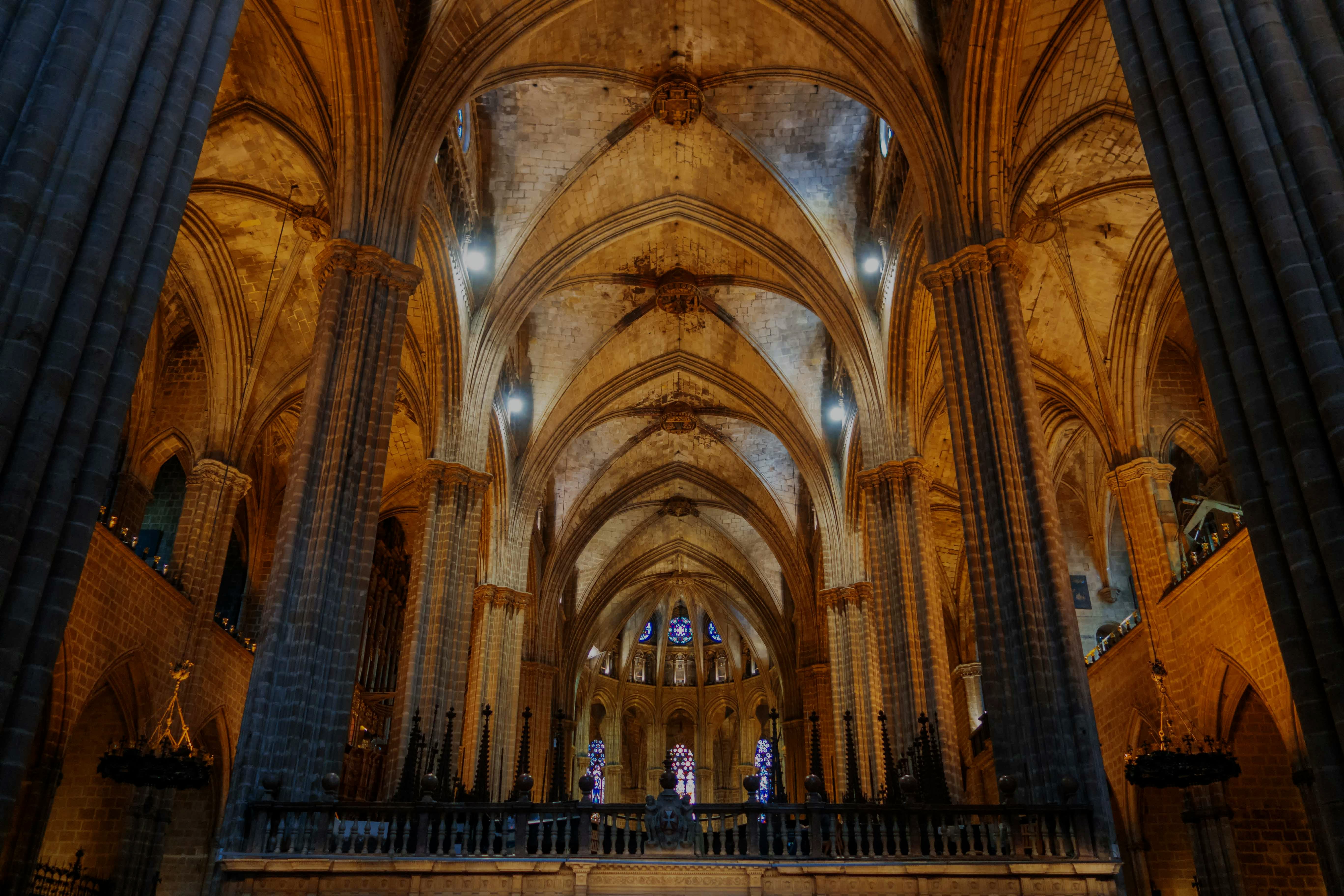 Sagrada Familia Crypt interior with intricate stone carvings, Barcelona, Spain.