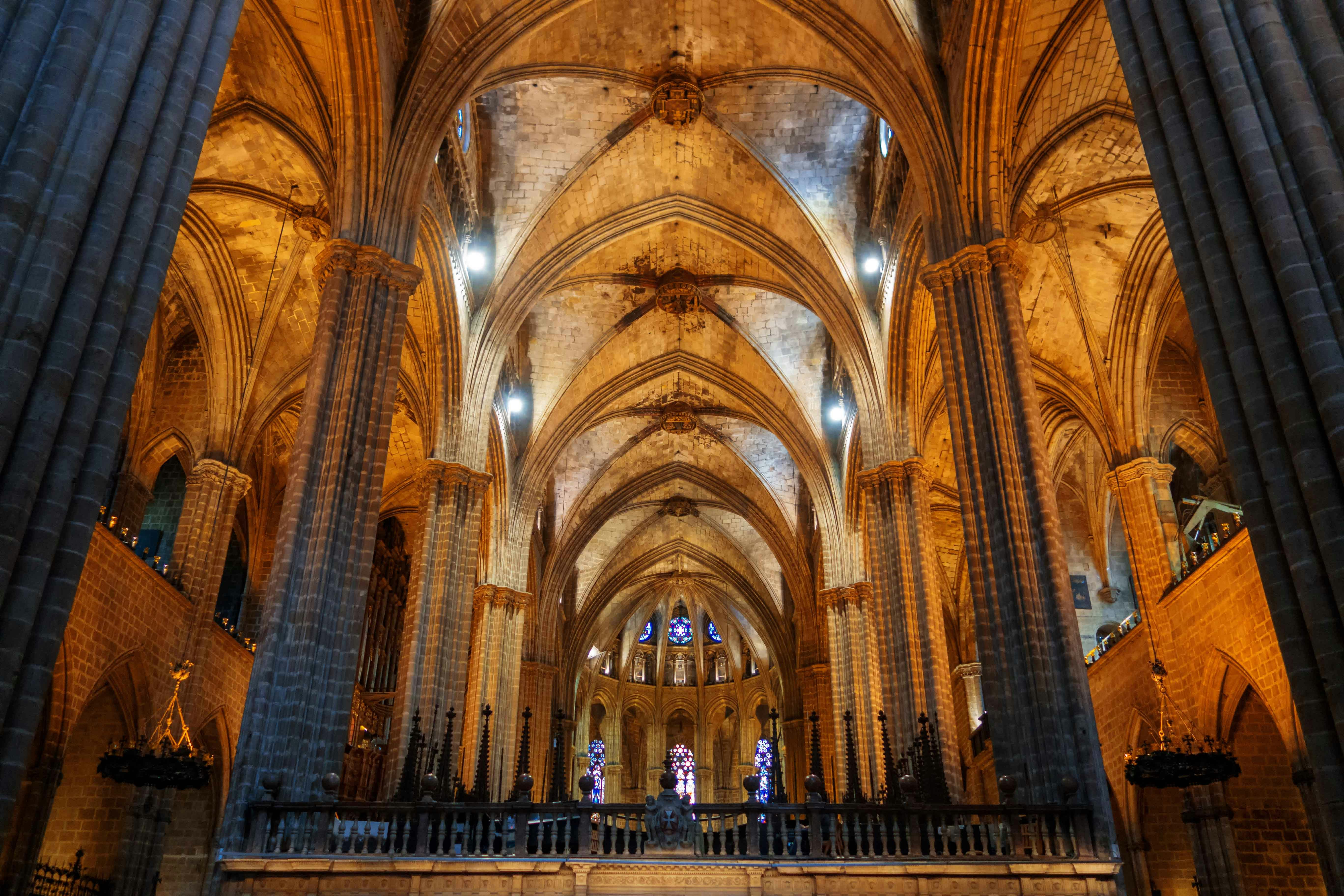 Sagrada Familia Crypt interior with intricate stone carvings, Barcelona, Spain.