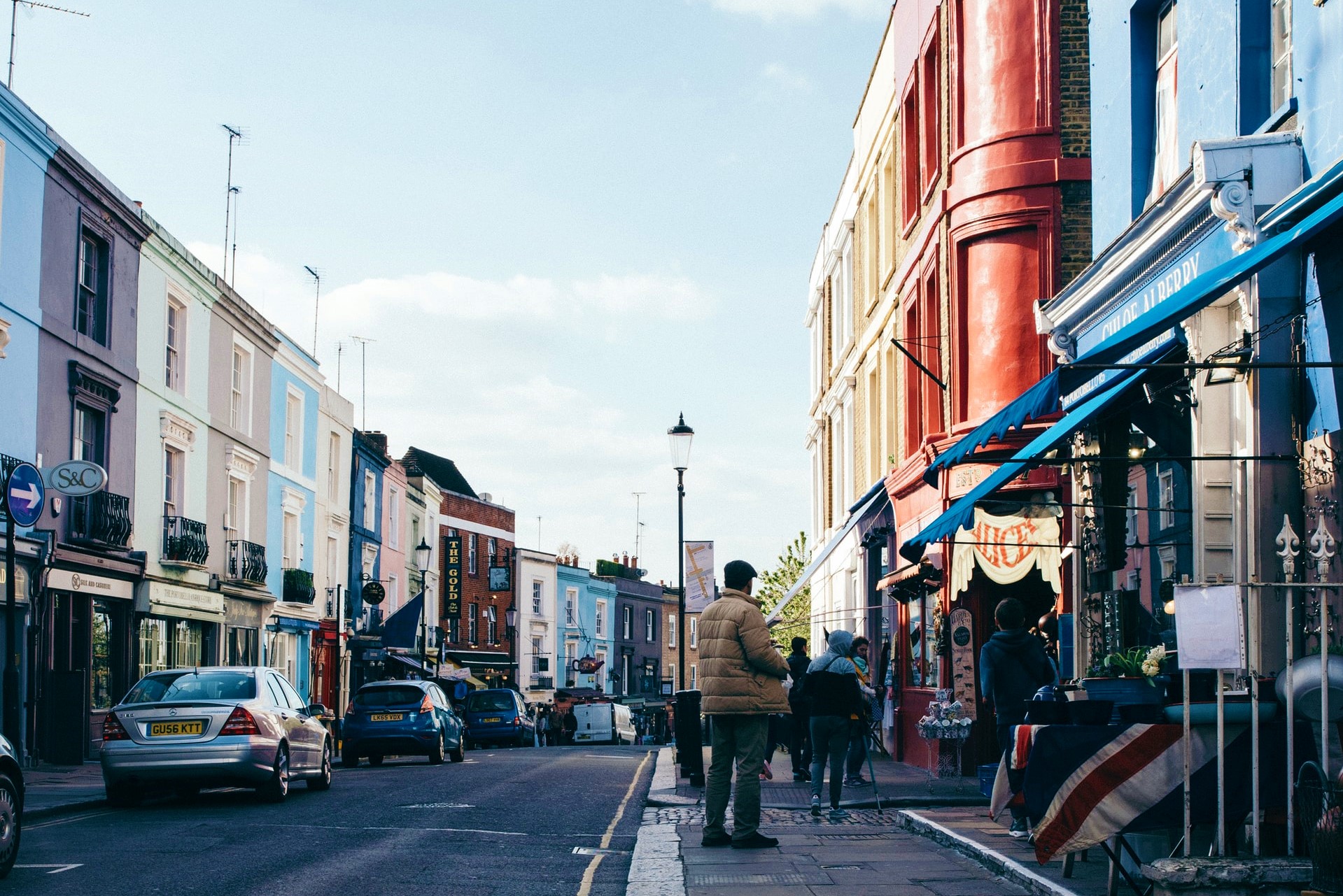 Colorful houses lining a street in Notting Hill, London.