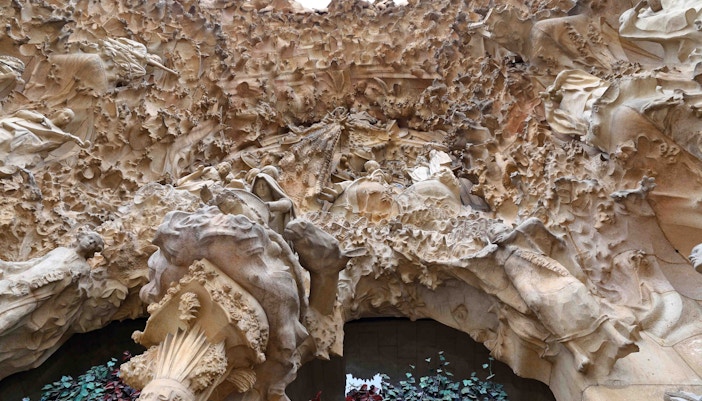 Sagrada Familia Passion Facade sculptures in Barcelona, Spain, depicting biblical scenes.