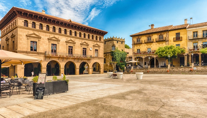 Poble Espanyol architecture view from Barcelona Hop-on Hop-off bus tour.