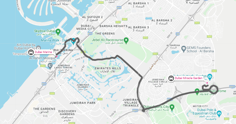 Dubai Miracle Garden vibrant floral archway with colorful blooms and pathways.