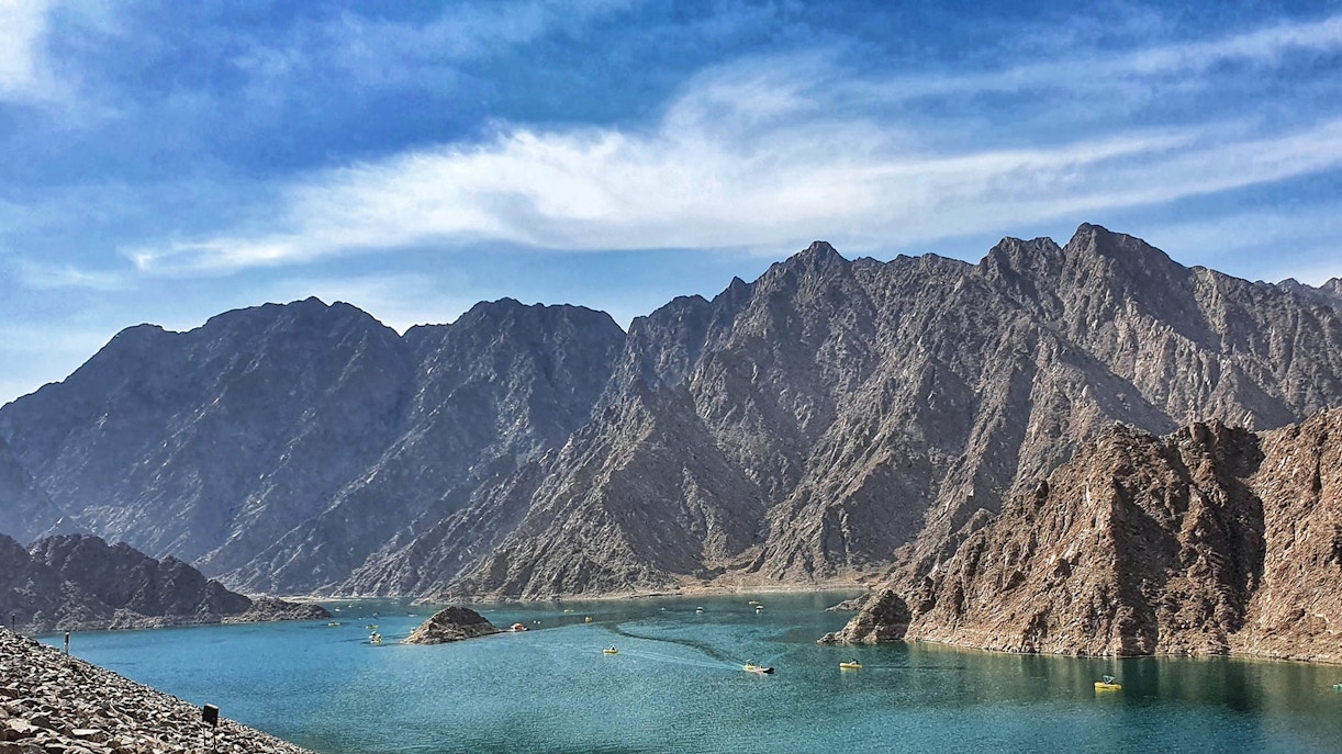 Lake at Haddi wadi with moutains in the background