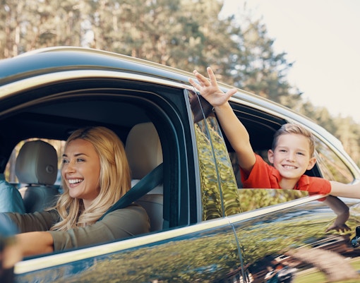 Family driving through forest en route to Phillip Island Nature Parks.