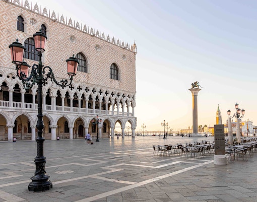 Doge's Palace exterior with ornate Gothic architecture in Venice, Italy.