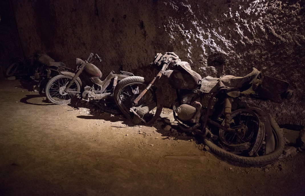Naples Underground tour showcasing forgotten war relics in historic tunnels.