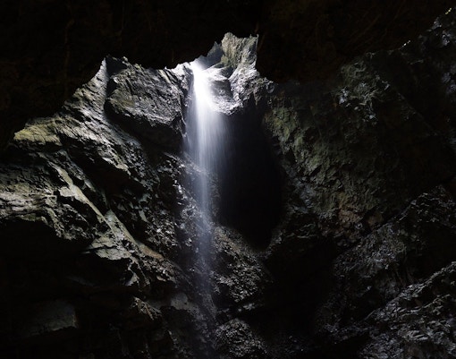 Chin Swee Temple Genting cave interior with intricate carvings and statues.