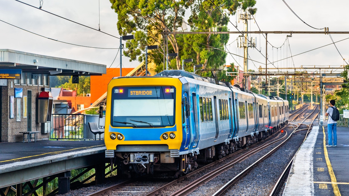 Train arriving at a suburban station en route to Peninsula Hot Springs.