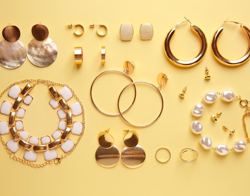 Jewelry display in a Rome shop showcasing necklaces and rings.