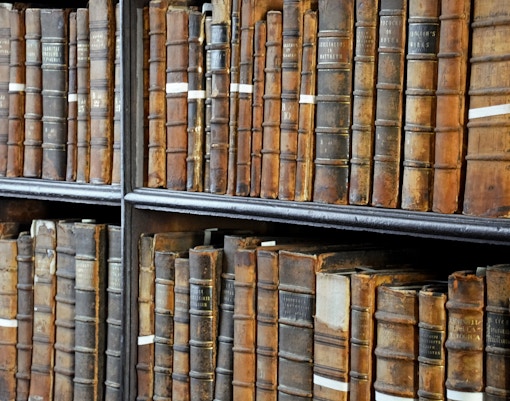 Ancient books on shelves in the Vatican Archives.