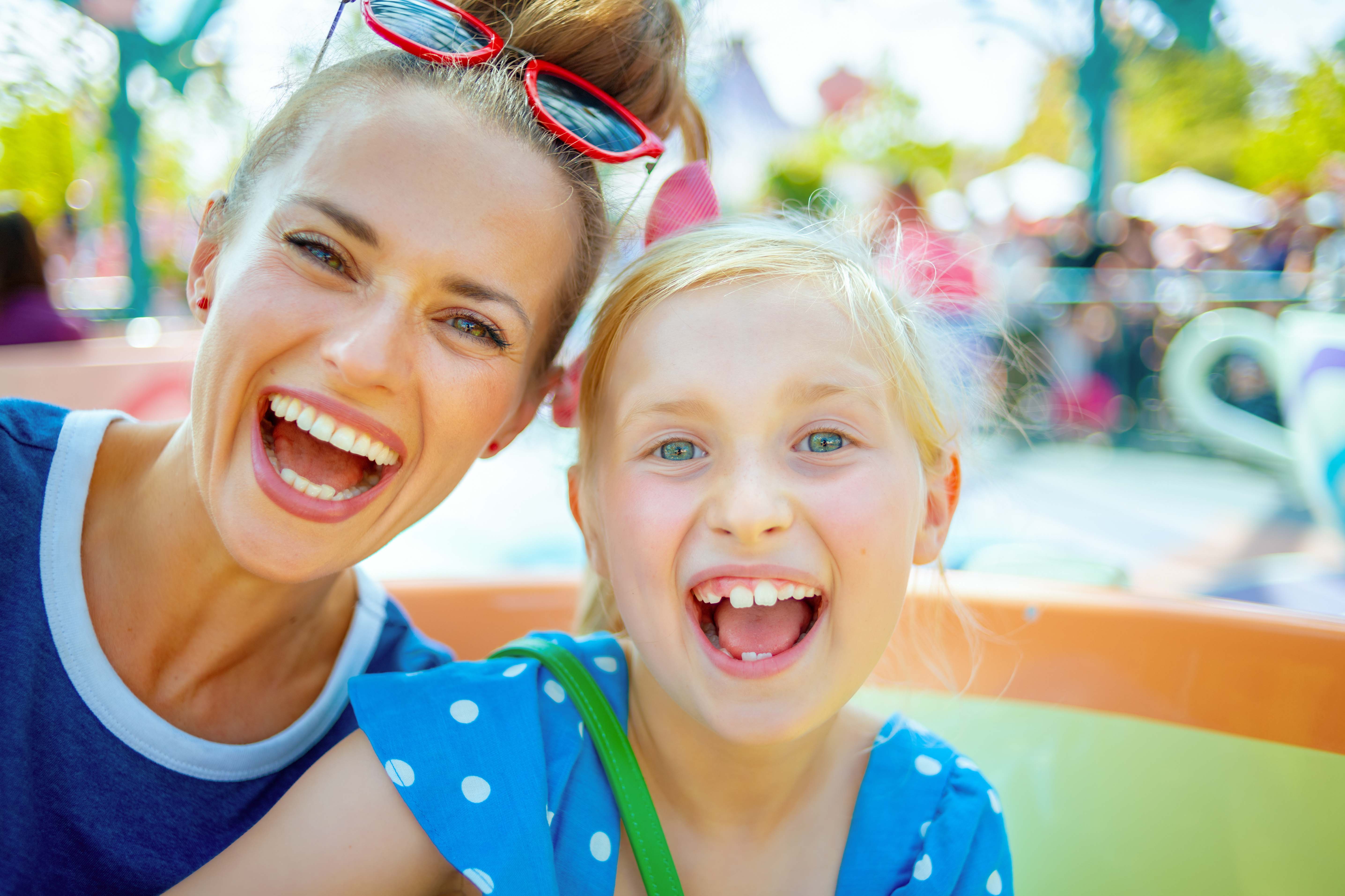 Children enjoying rides at Sestolandia theme park in Florence.