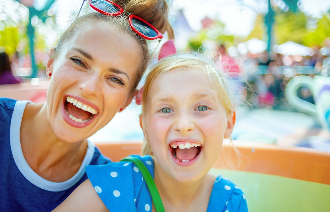 Children enjoying rides at Sestolandia theme park in Florence.