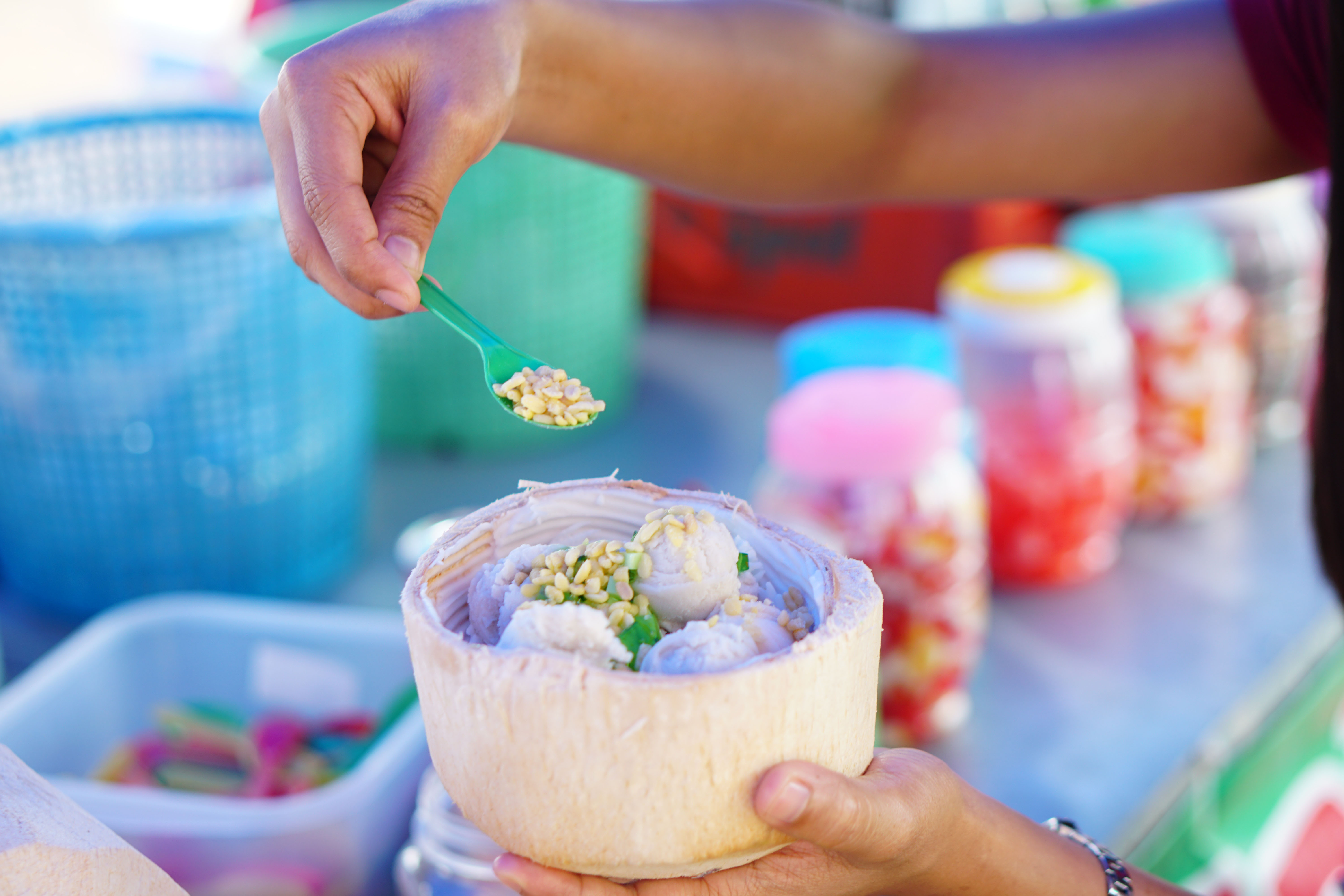 Changi Village Hawker Centre bustling with people enjoying Singapore street food.
