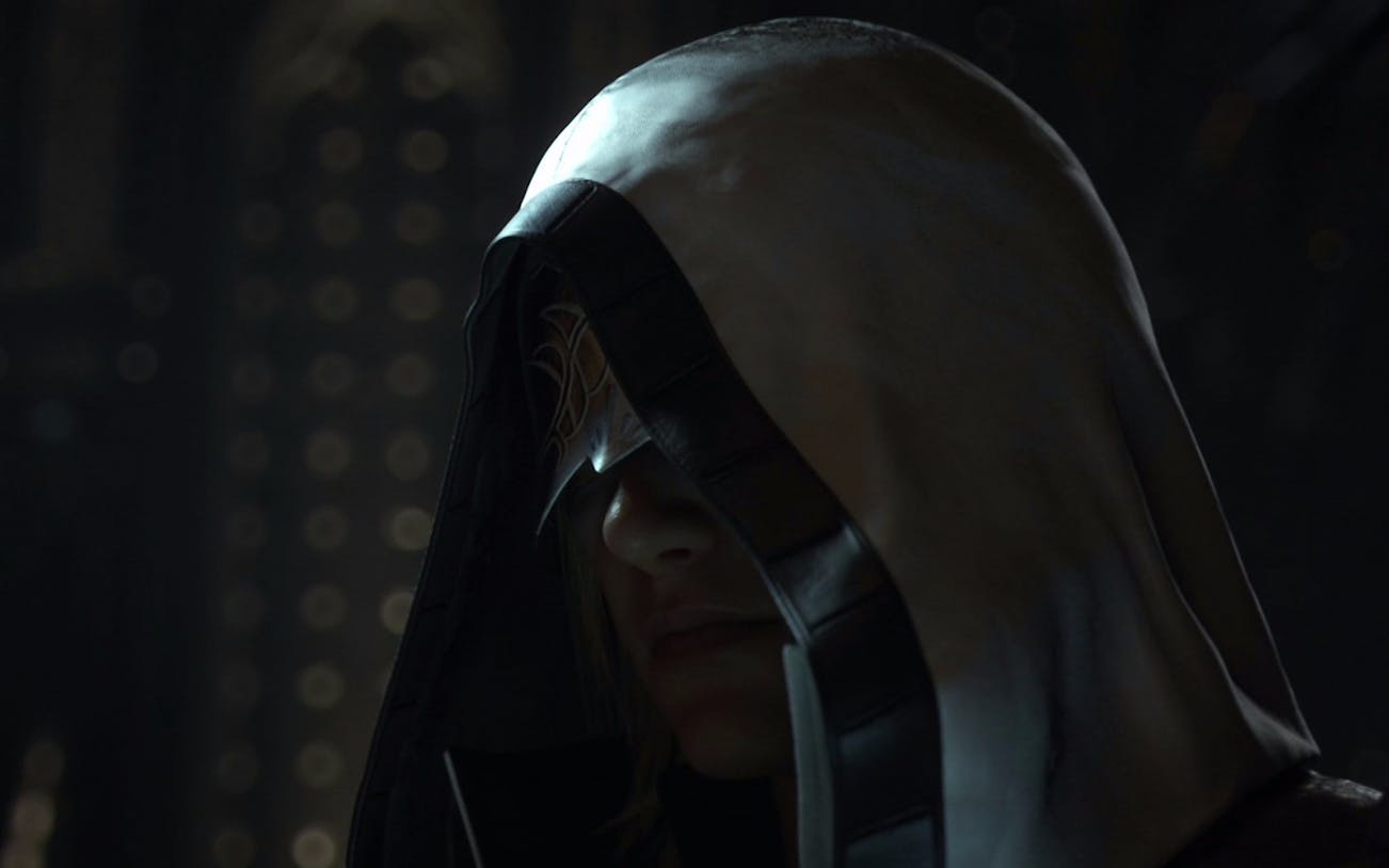 Hooded figure in dimly lit setting, related to "The Longest Con" tour.