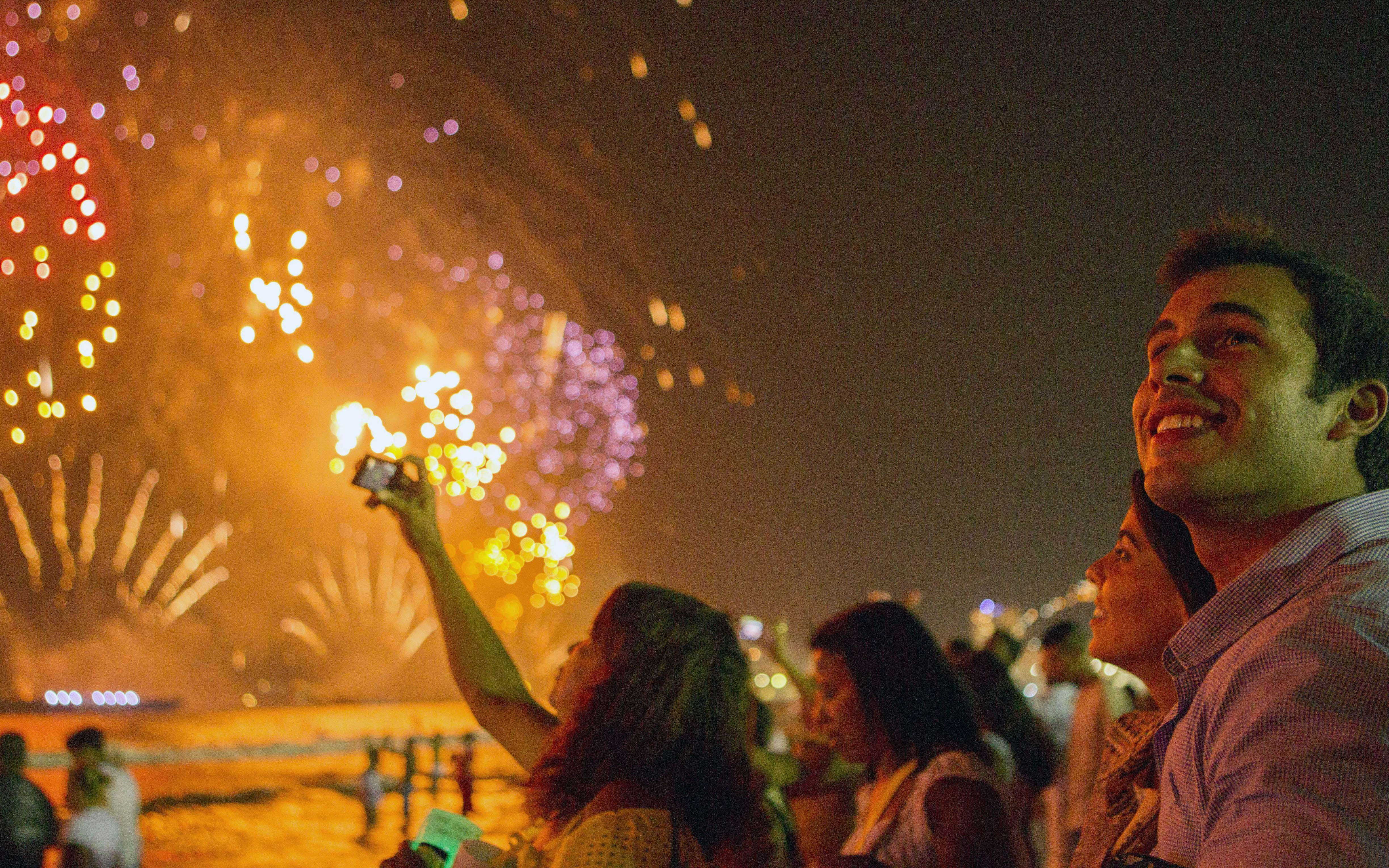 New Year's Eve fireworks over New York City skyline from Moonlight Party Cruise.