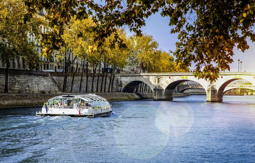 Bateaux Parisiens cruise on Seine River with Eiffel Tower view, Paris New Year’s Eve 2025.
