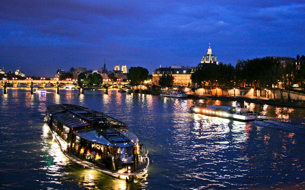 paris seine river gourmet dinner cruise with champagne