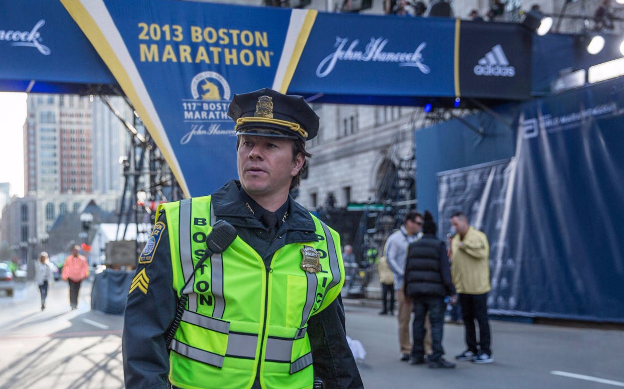 Boston police officer at 2013 Boston Marathon during Patriots Day event.