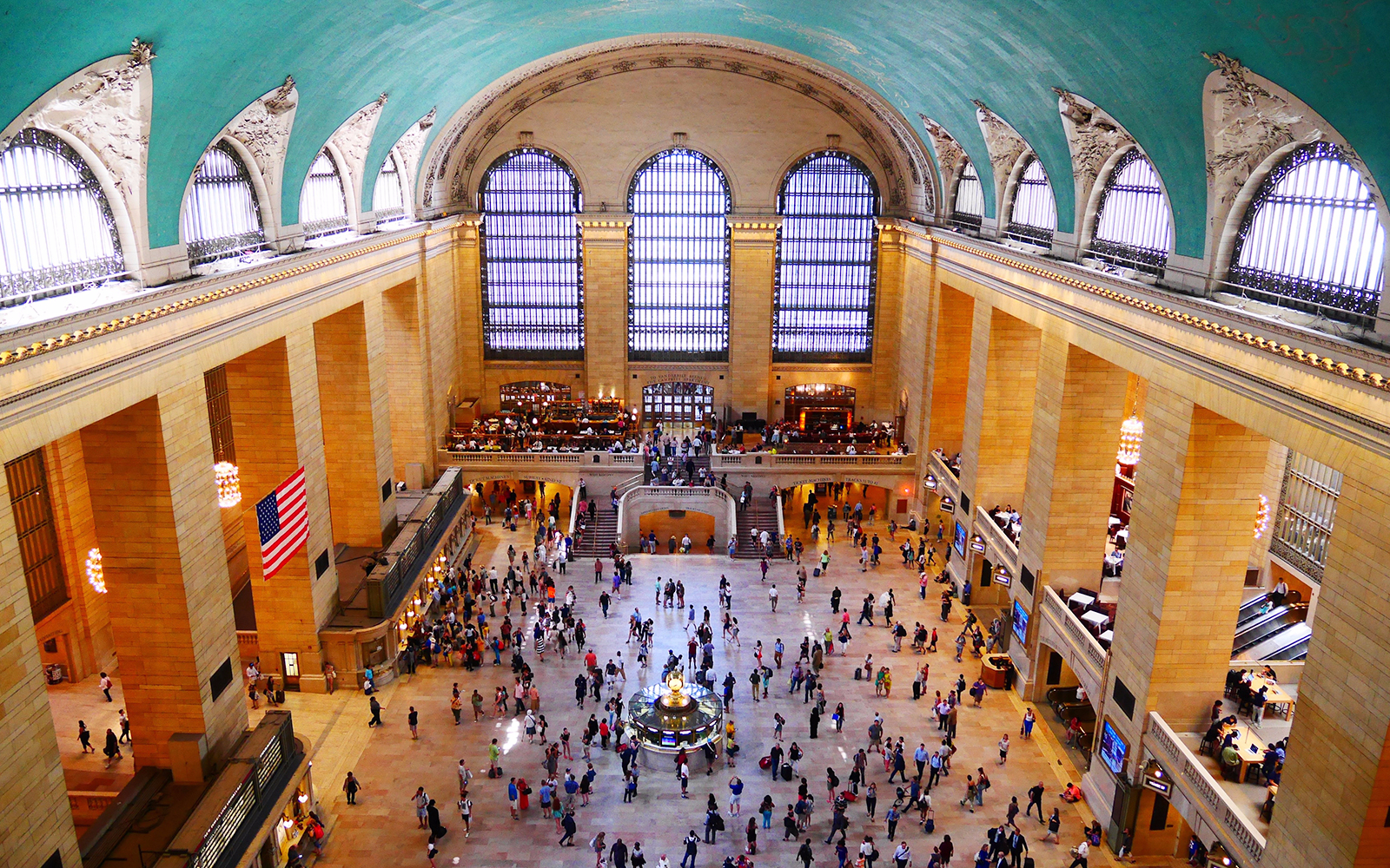 Grand Central Terminal main concourse with crowds and iconic clock.