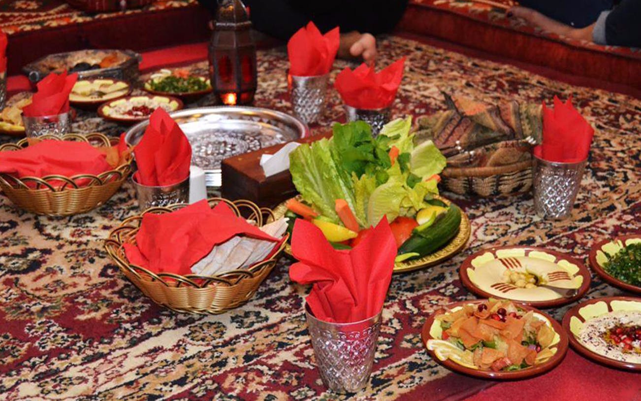 Traditional Middle Eastern meal setup at Barjeel Al Arab, Barjeel Heritage Guest House.