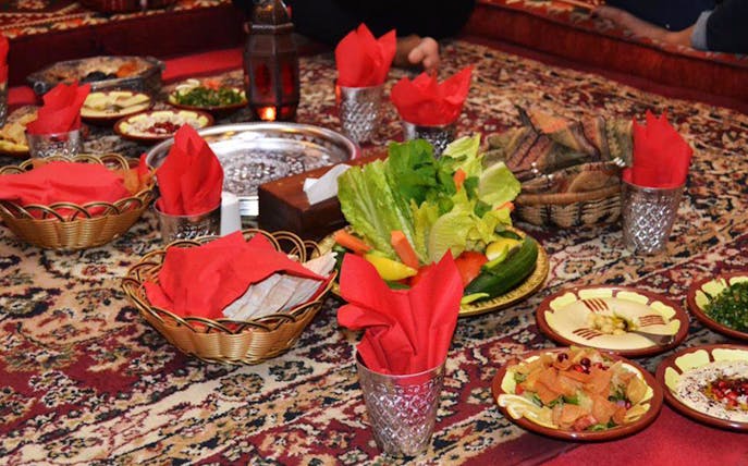 Traditional Middle Eastern meal setup at Barjeel Al Arab, Barjeel Heritage Guest House.