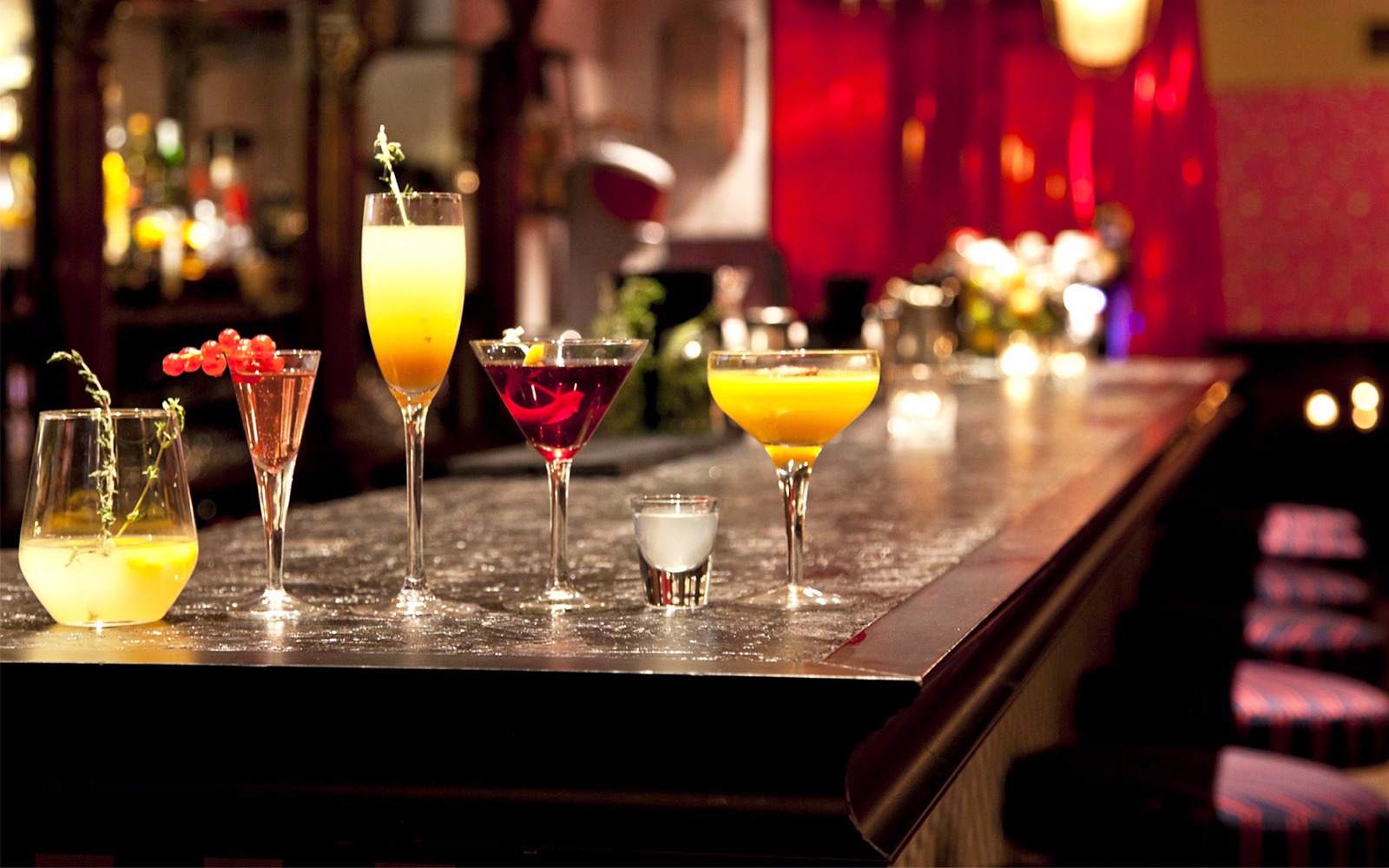 Cocktail selection on a bar counter at the NY Cocktail Expo.