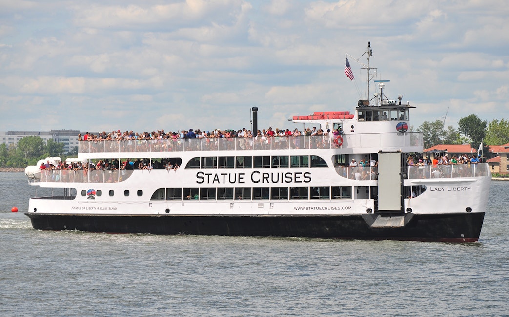 Statue Cruises ferry on New York Harbor for Statue of Liberty tour.
