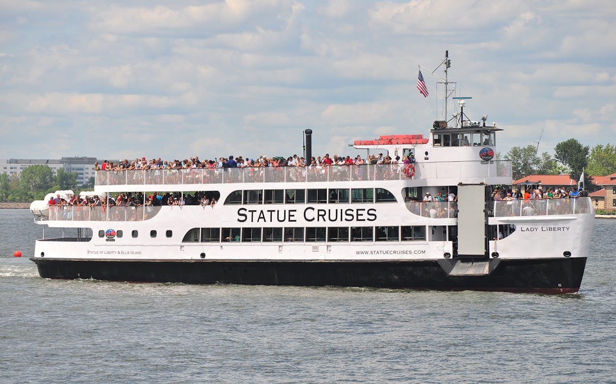 Statue Cruises ferry on New York Harbor for Statue of Liberty tour.