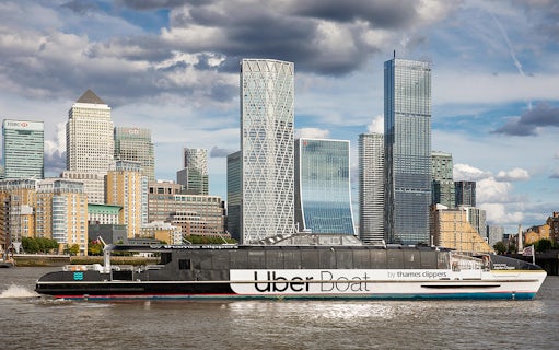 Uber Boat by Thames Clippers on the River Thames with London skyline.