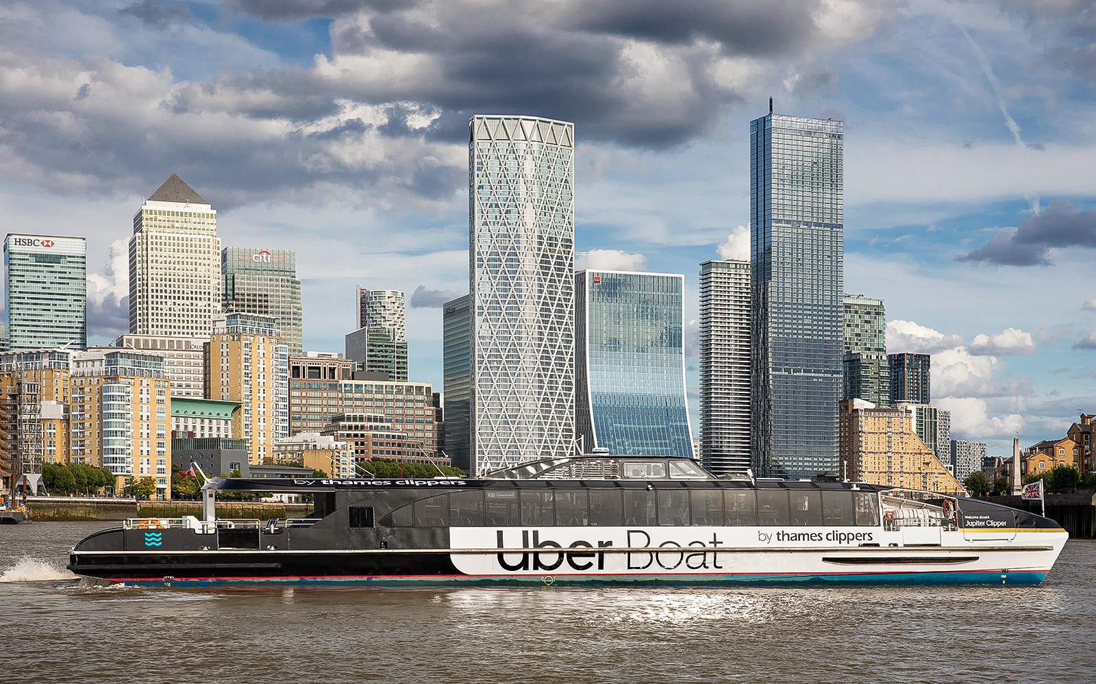 Uber Boat by Thames Clippers on the River Thames with London skyline.