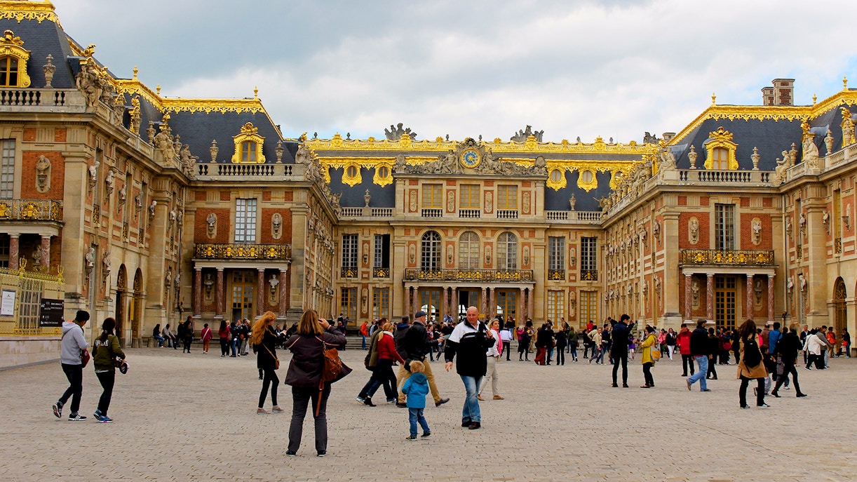 Visitors outside Versailles Palace