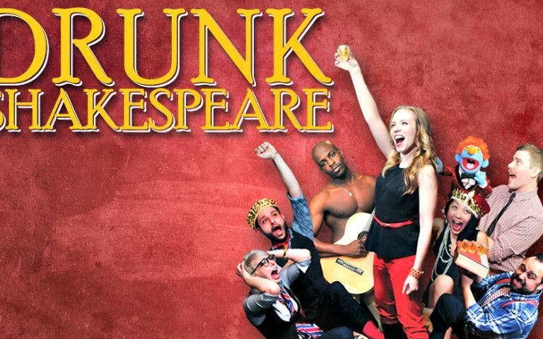 Actors performing Drunk Shakespeare with props and costumes on stage.