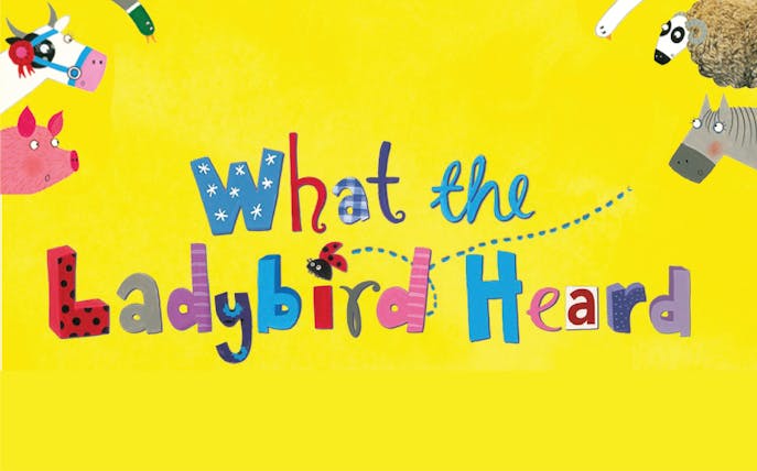 What The Ladybird Heard title with colorful letters and farm animals on yellow background.