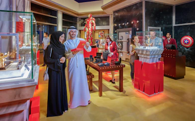 Visitors exploring Marvel exhibits at IMG Worlds of Adventure, Dubai.
