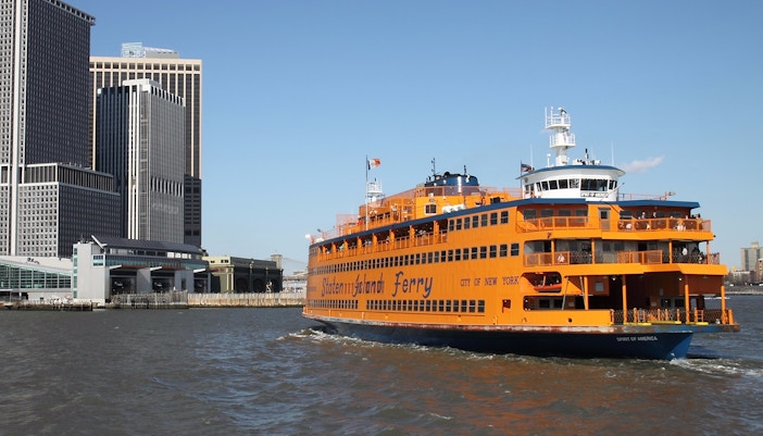 Staten Island Ferry approaching Manhattan skyline, part of Amazing New York Package.
