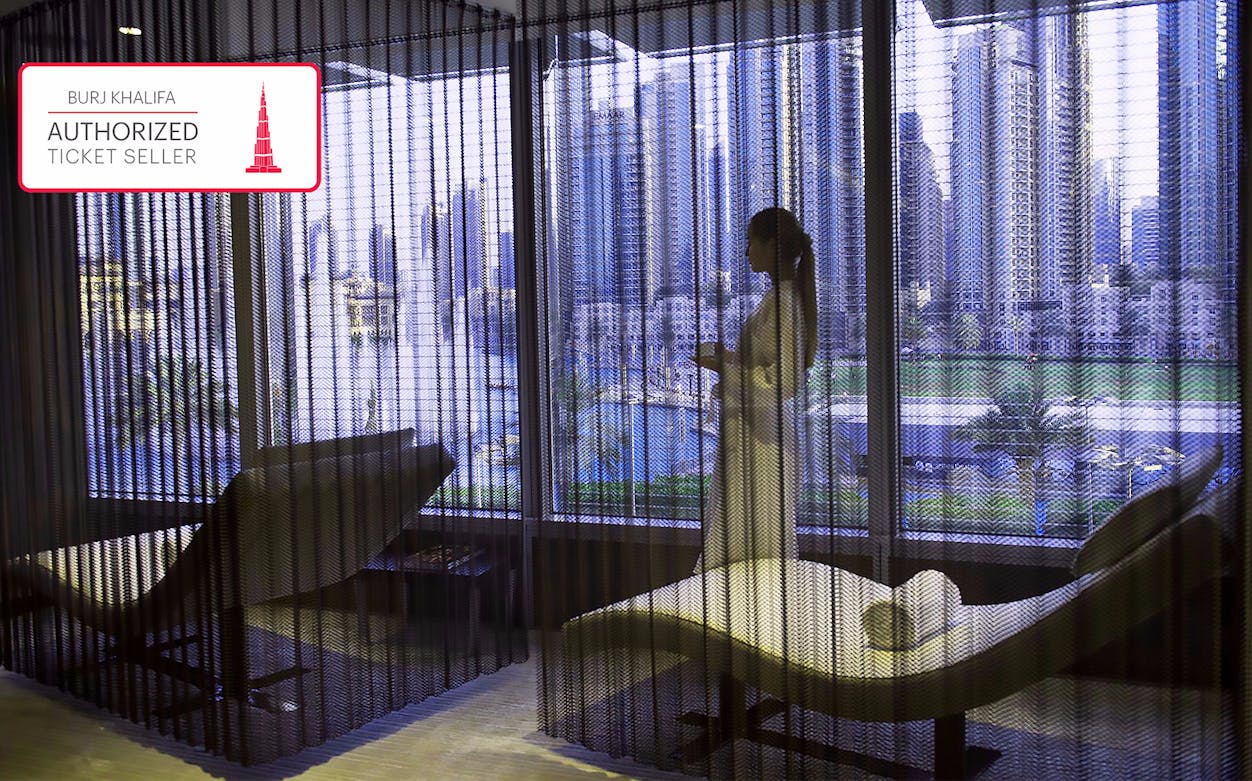 Spa treatment room with city view at The Burj Club, Dubai.