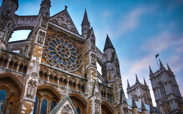 Westminster Abbey facade with rose window, London day trip from Paris.