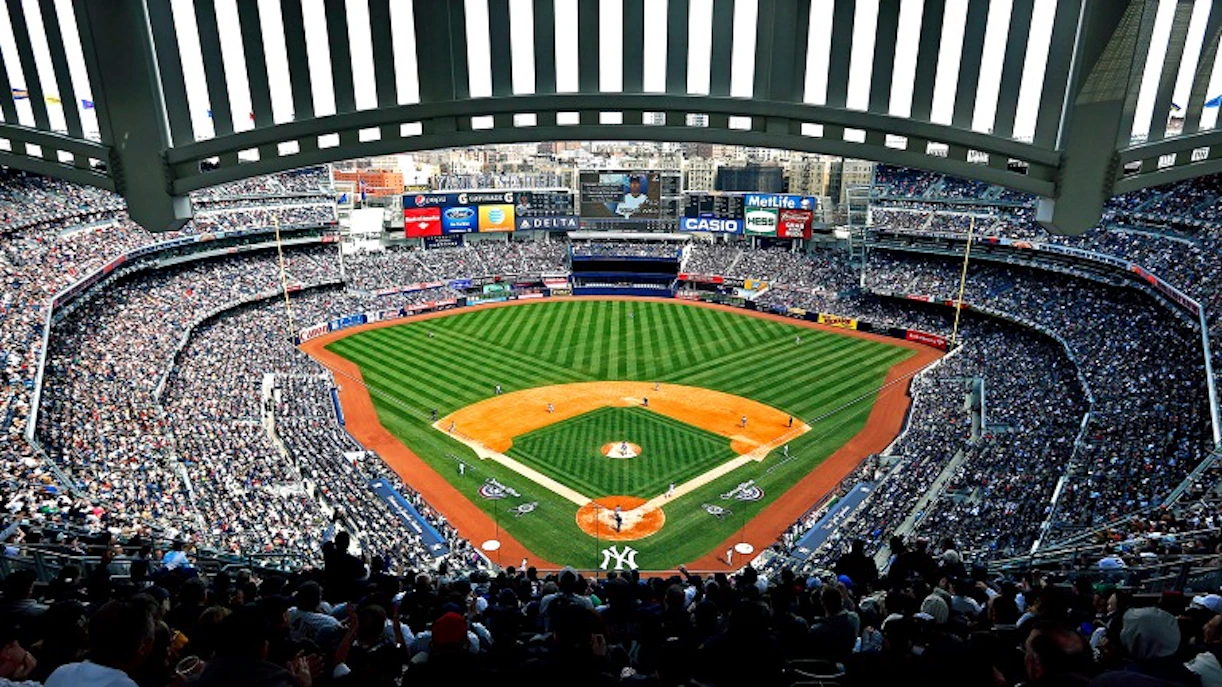 Yankee Stadium view during a baseball game, showcasing the field and crowd.