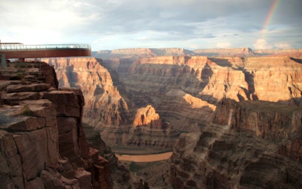 Grand Canyon West Rim with Skywalk overlooking canyon and river below.