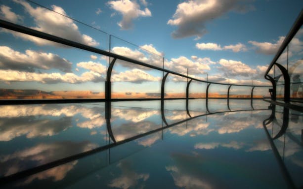 Skywalk at Grand Canyon West Rim with glass walkway and scenic views.