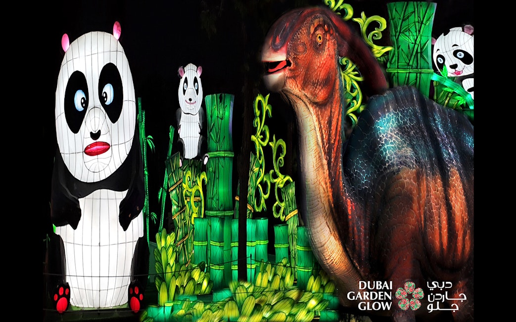 Panda and dinosaur light installations at Dubai Garden Glow.