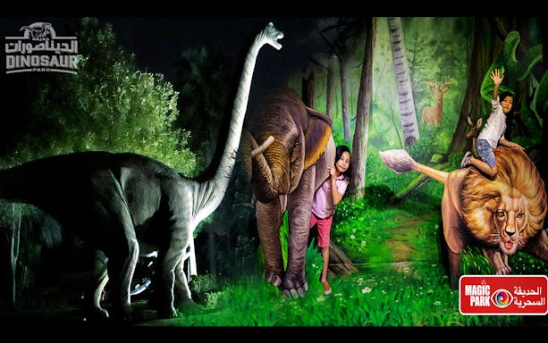 Children interacting with dinosaur and animal sculptures at Magic Park, part of the Combo: Warner Bros + Garden Glow tour.