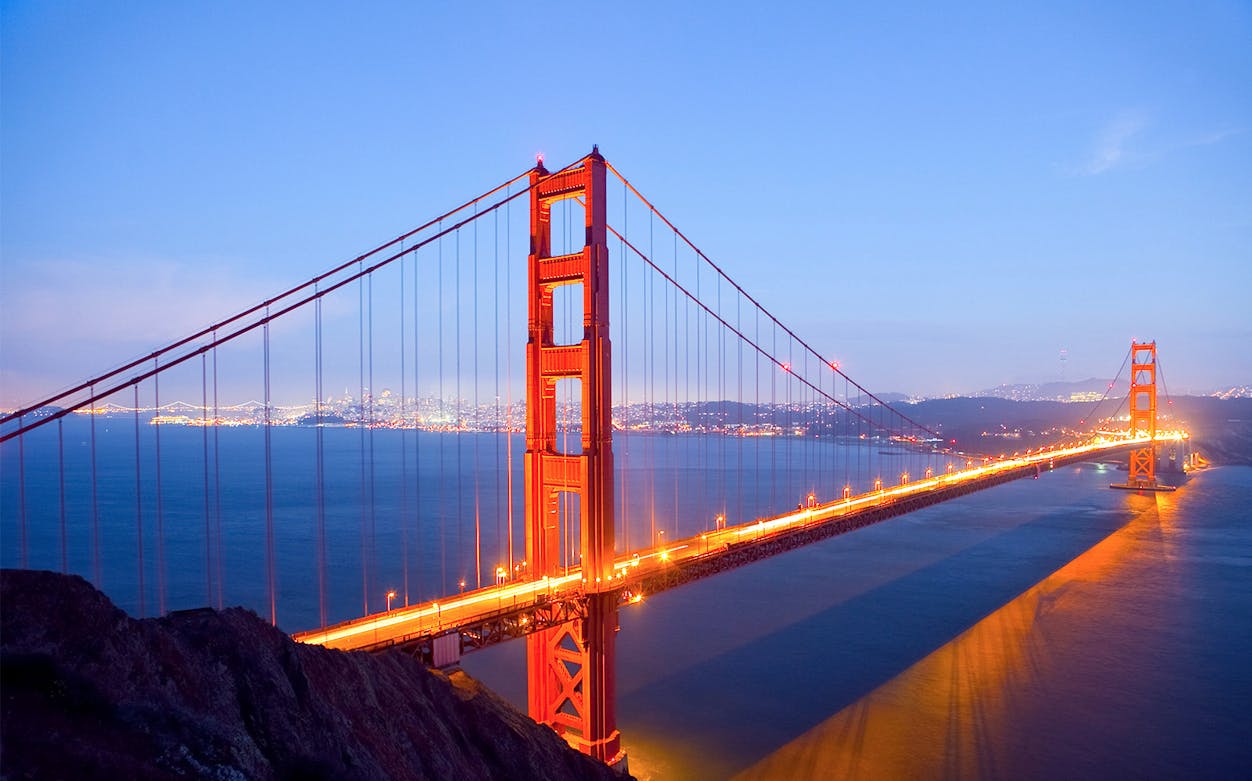 Golden Gate Bridge at dusk during San Francisco City Tour and Escape from the Rock Cruise.