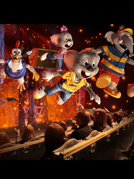 Visitors enjoying 4D animated characters at Sentosa Adventureland.