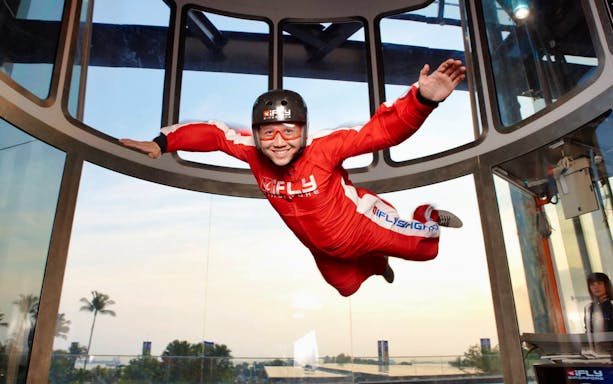 Person indoor skydiving at iFly Singapore.